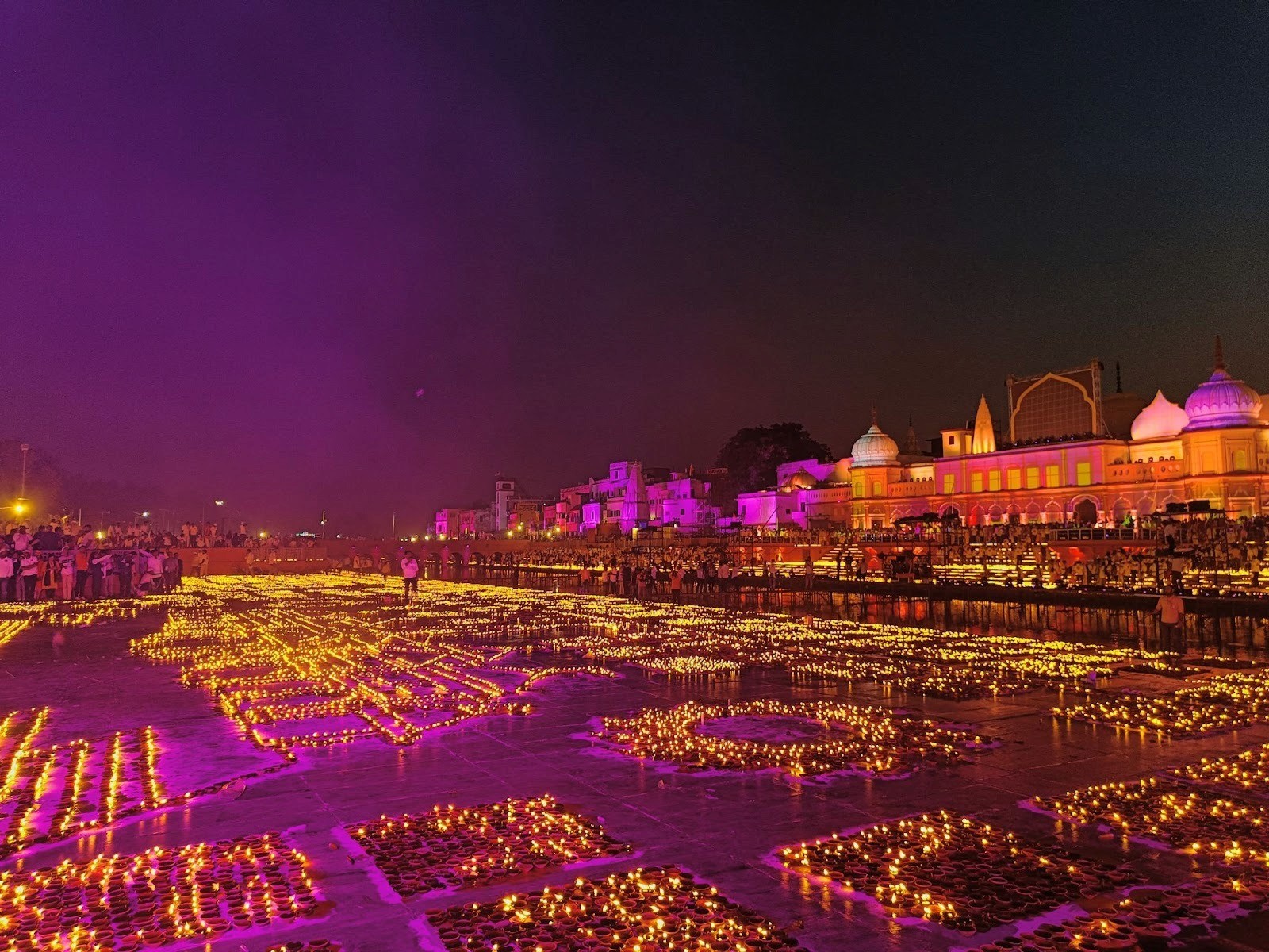 The lights of thousands of diyas (lamps) bobbing on the water of the Saryu River in Ayodhya as part of Diwali celebrations
