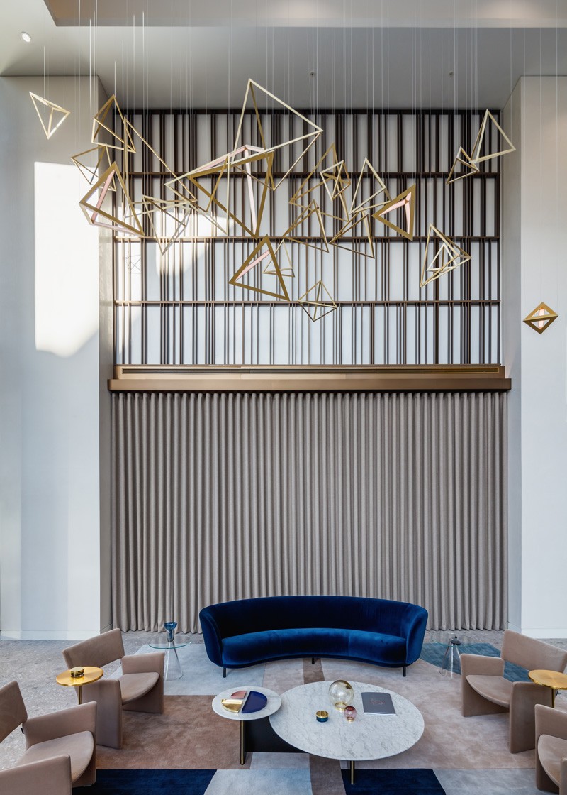 Bangle LED lighting installation – geometric composition of pyramidal aluminium modules with diffused LED strips