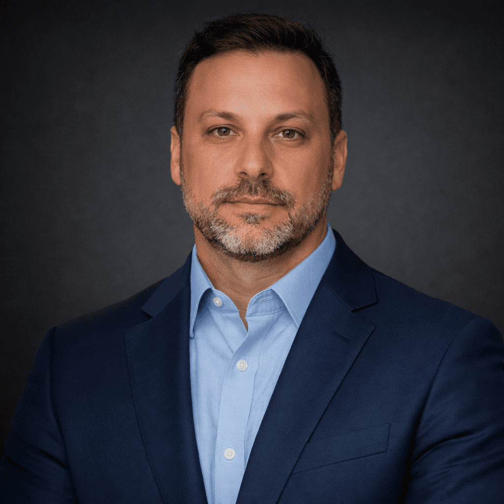 a man in a suit and tie reading a newspaper