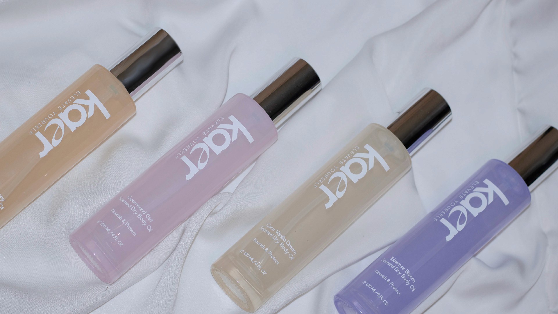 silver MacBook Air on table near iMac