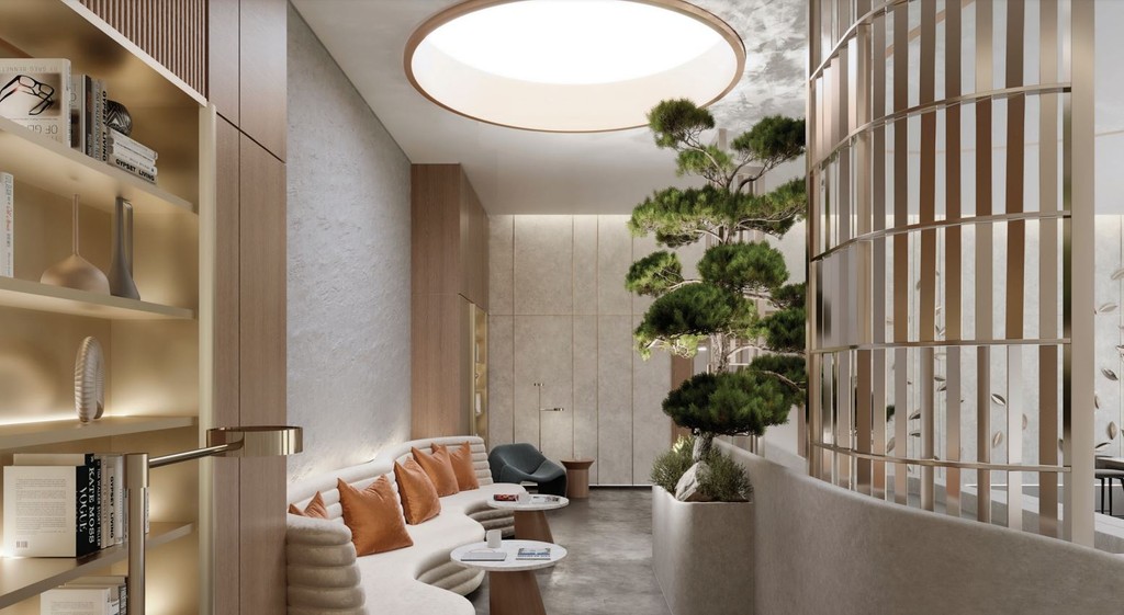 A modern living room featuring a stylish couch and bookshelves, showcasing the Crestmark design aesthetic.