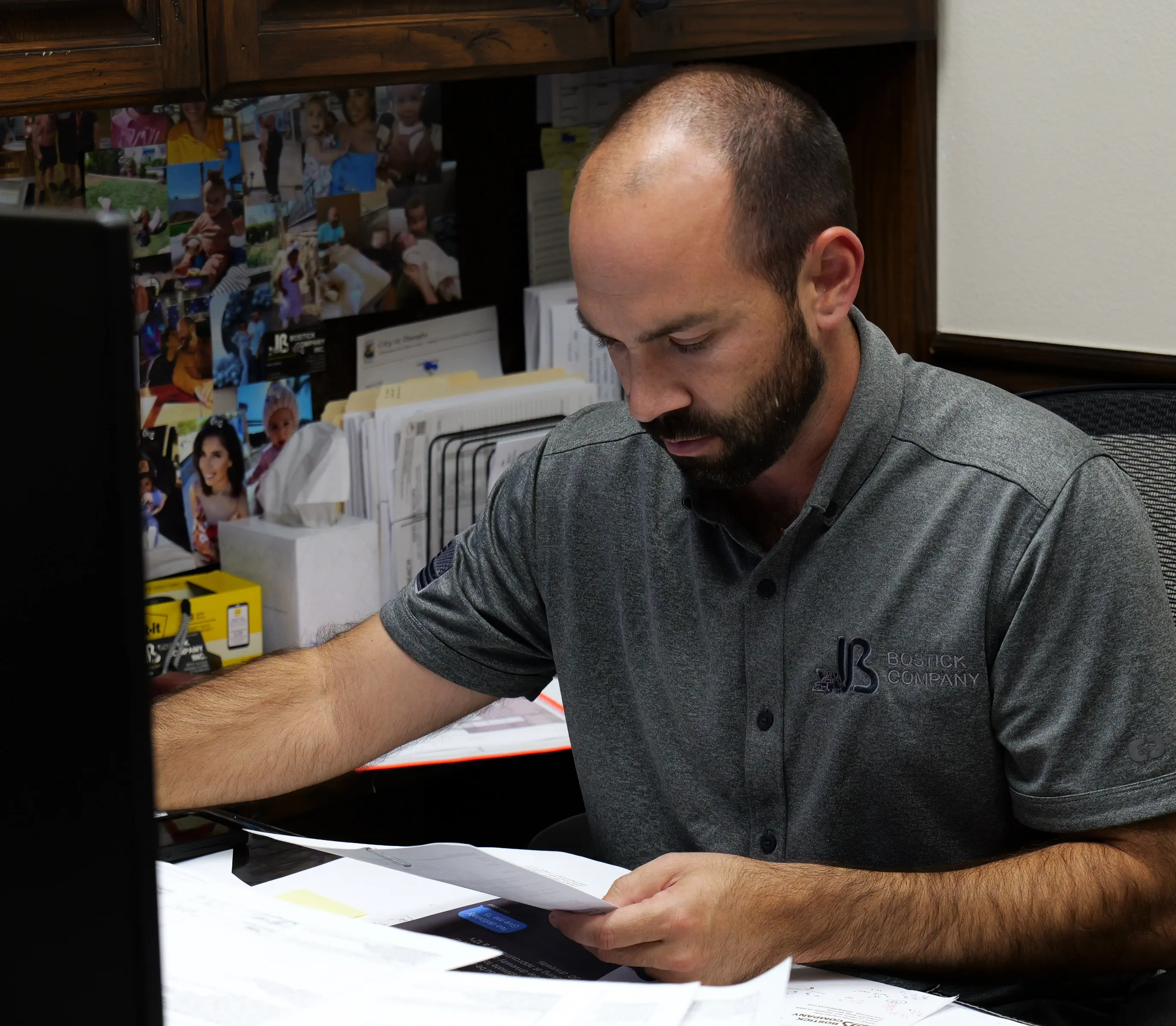 Man diligently working at desk