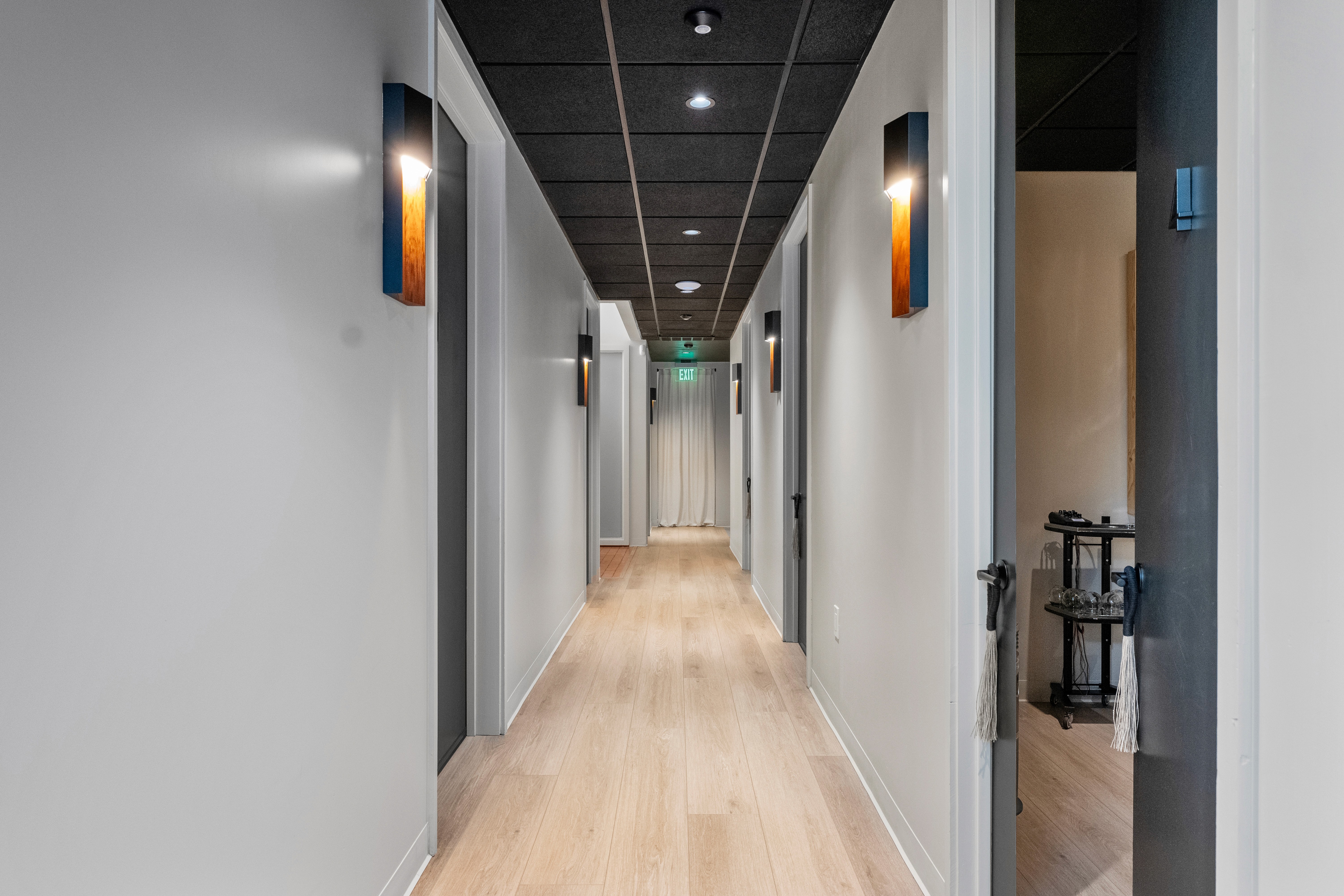 “Bright bathroom remodel with freestanding tub, glass shower, and custom wood vanity”