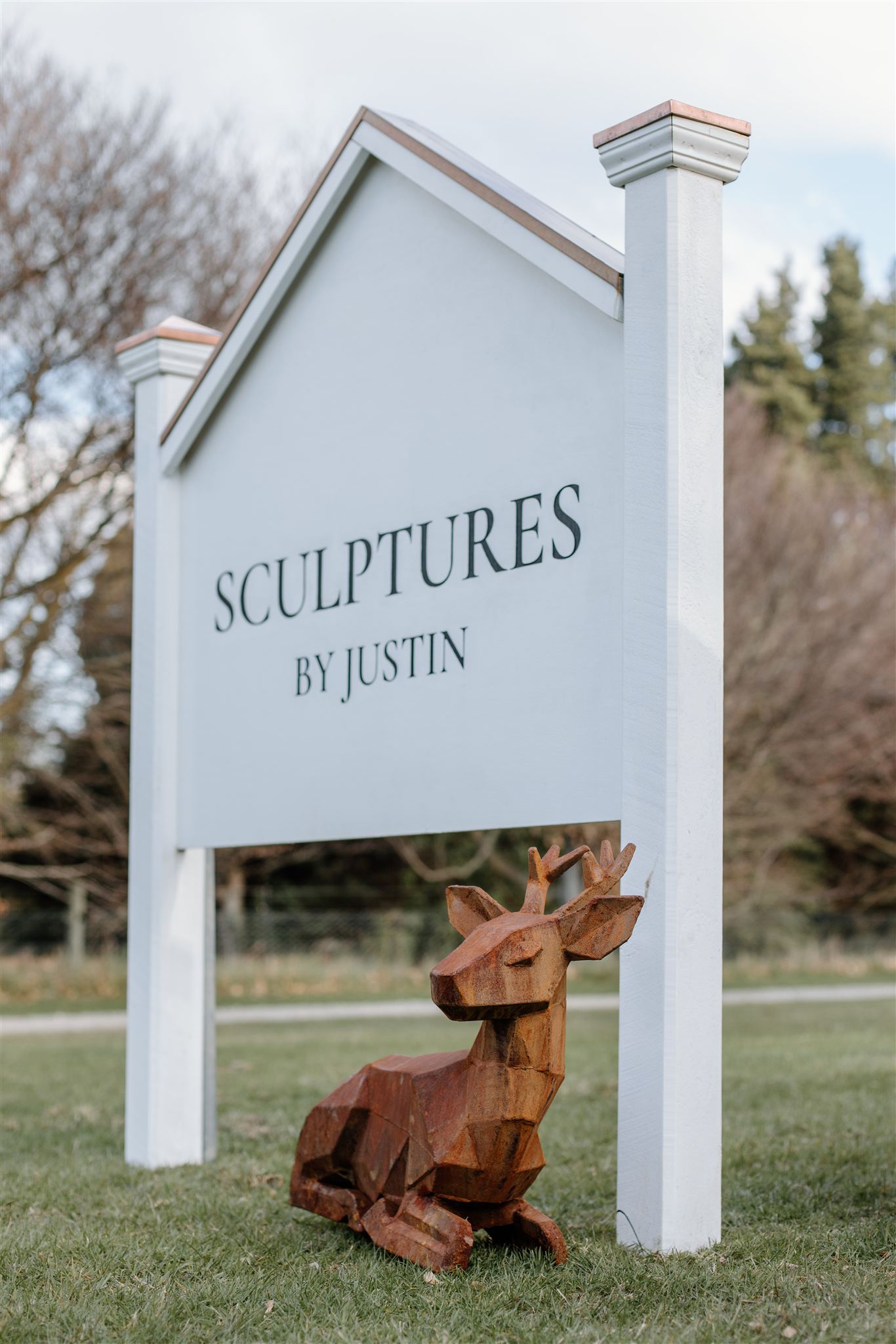 Woman in gallery with colorful paintings