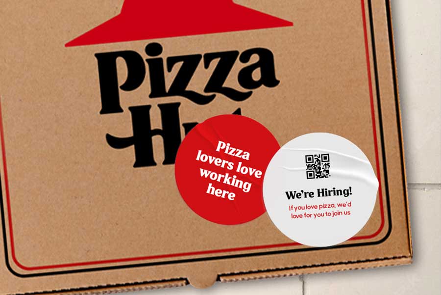 Design example of Pizza Hut's recruitment stickers on a pizza box