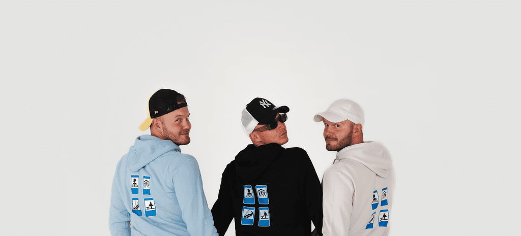 Man wearing a MONOVO sweatshirt sitting in a casual pose