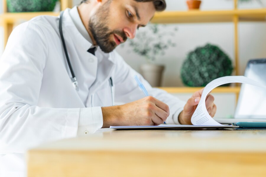 A doctor describing the patient and discussing reports.