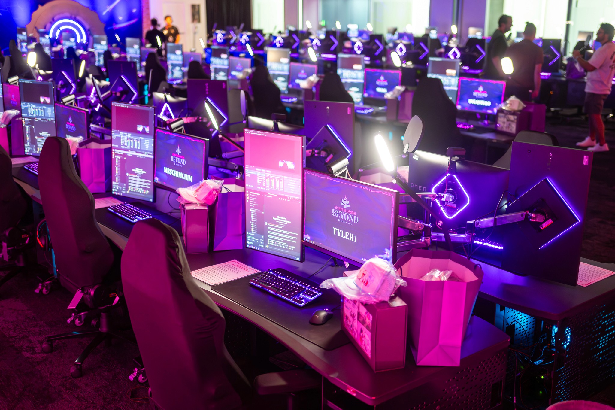 A panel of speakers on stage discussing topics with the audience at the summit.