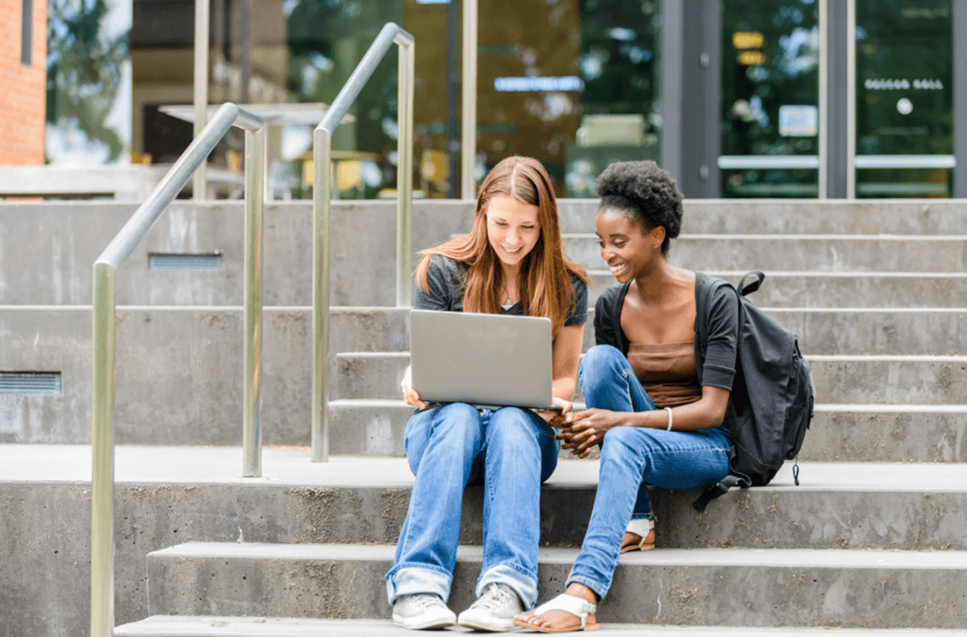 High school student sharing a published research paper on LinkedIn profile on a laptop