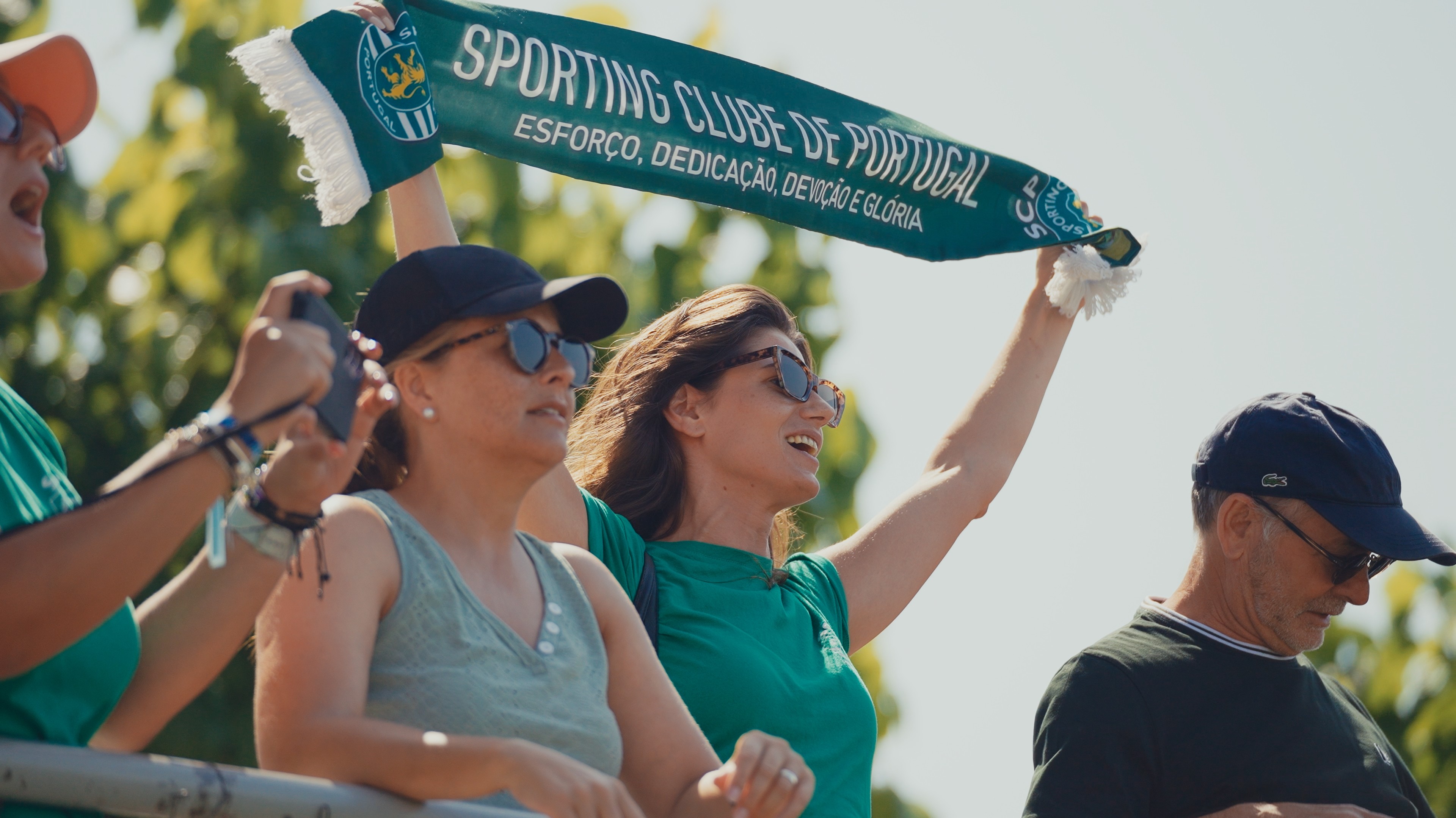 A woman with a head made of mirrors, reflecting light and creating a kaleidoscopic effect around her.