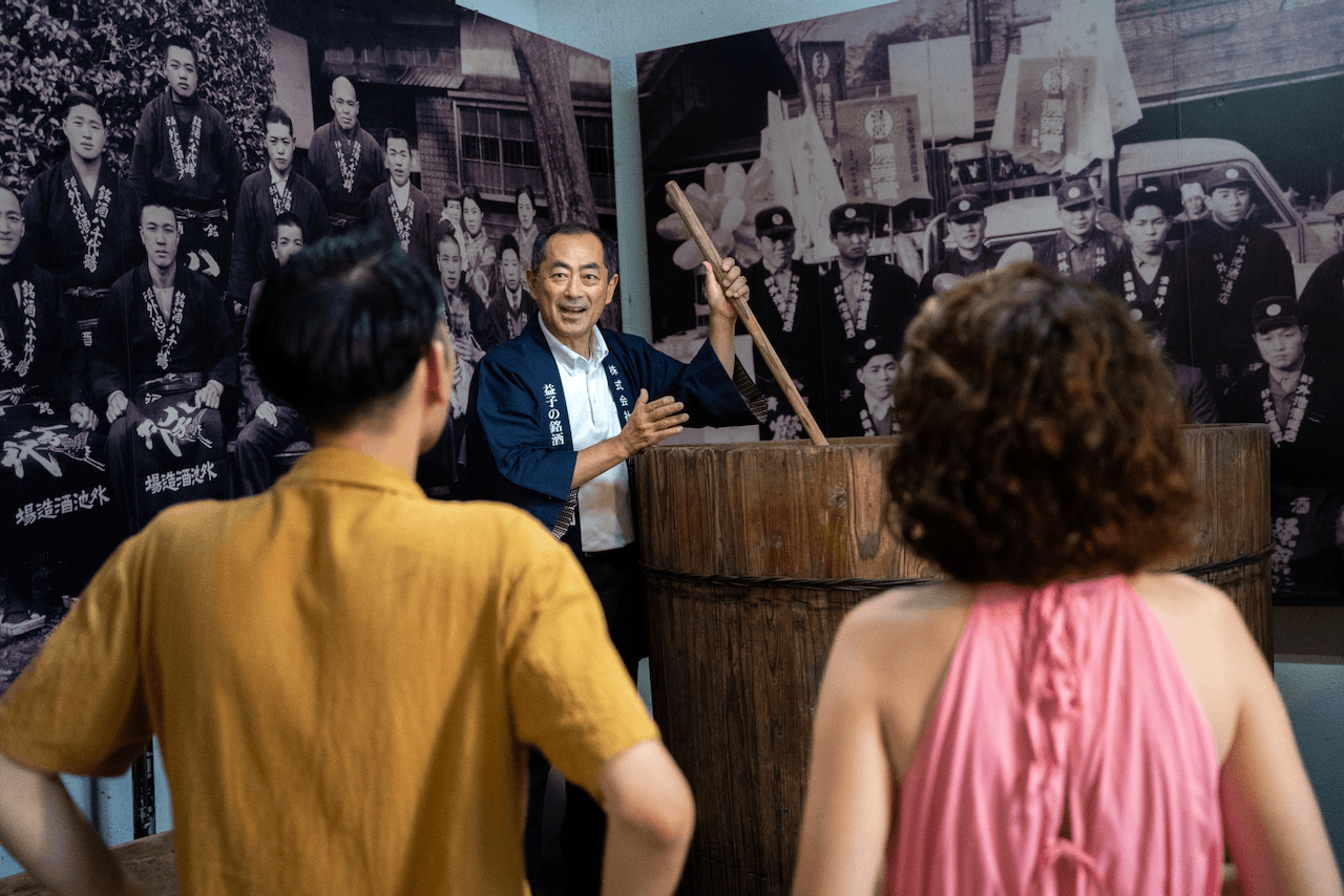 Sake guide providing a sake tour