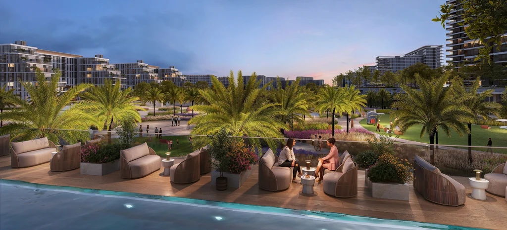 Serene outdoor pool at Parkland: palm trees, greenery, relaxing people, clear sky. Tranquil resort vacation.