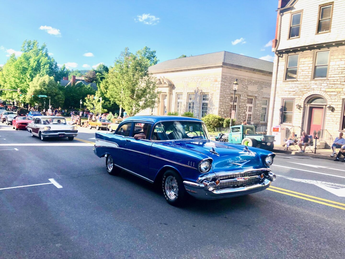 nfinity pool blending into the ocean view, minimalist sun loungers in soft neutral fabric, curved architecture