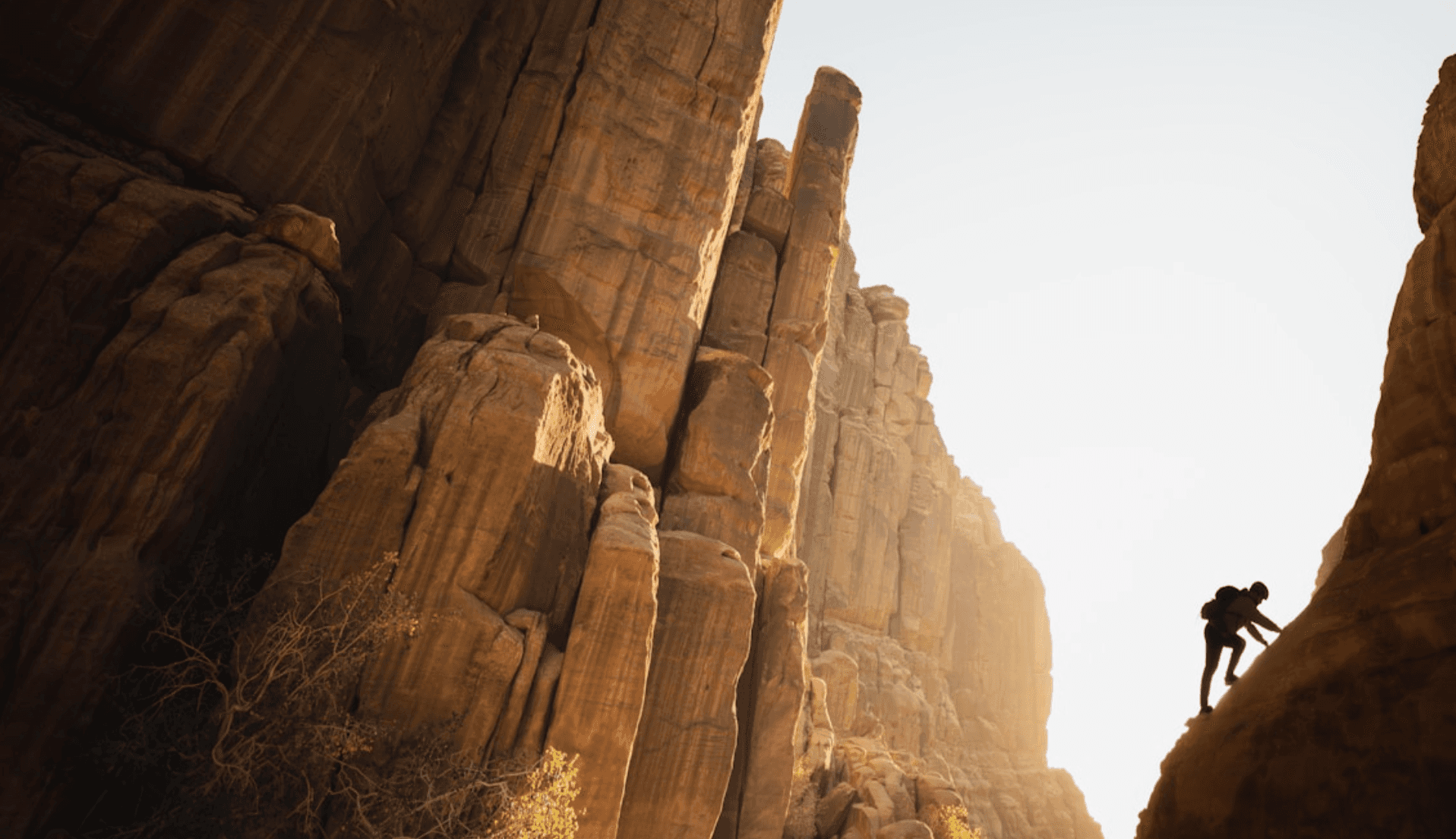 Man climbing a rock