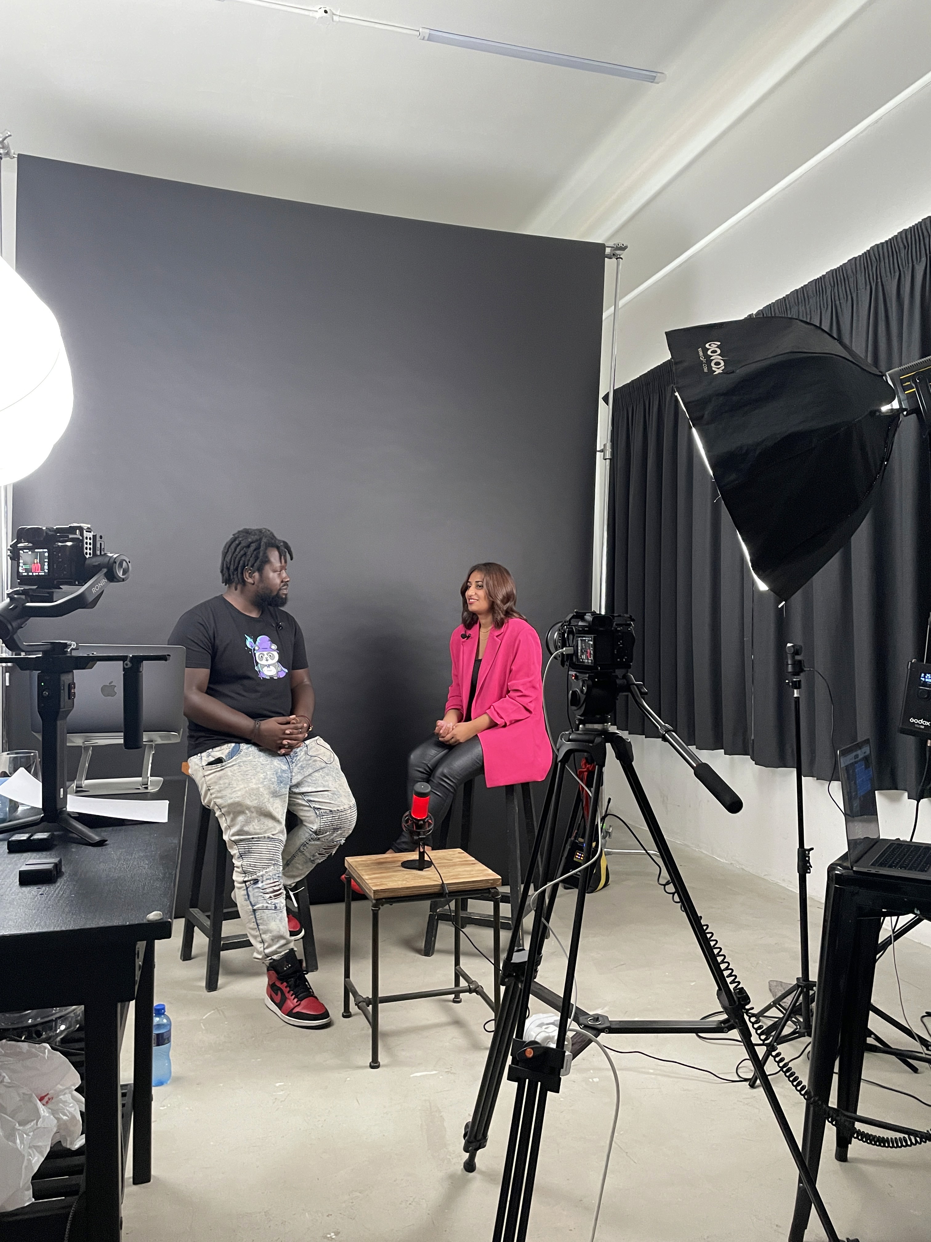 black car with half white and half black background