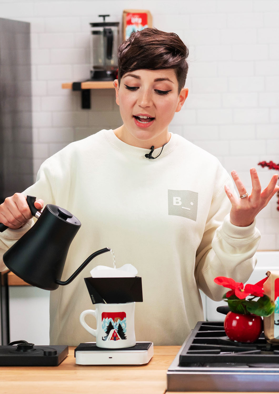 Sam Spillman prepares a single batch pour over for Cafe Vita and King 5 News on the studio kitchen set at Particle Studio in Seattle, WA.