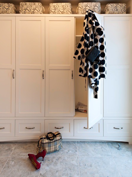 Image of Custom closet design with built-in cabinets, drawers, and organized storage by KHD Homes interior design.