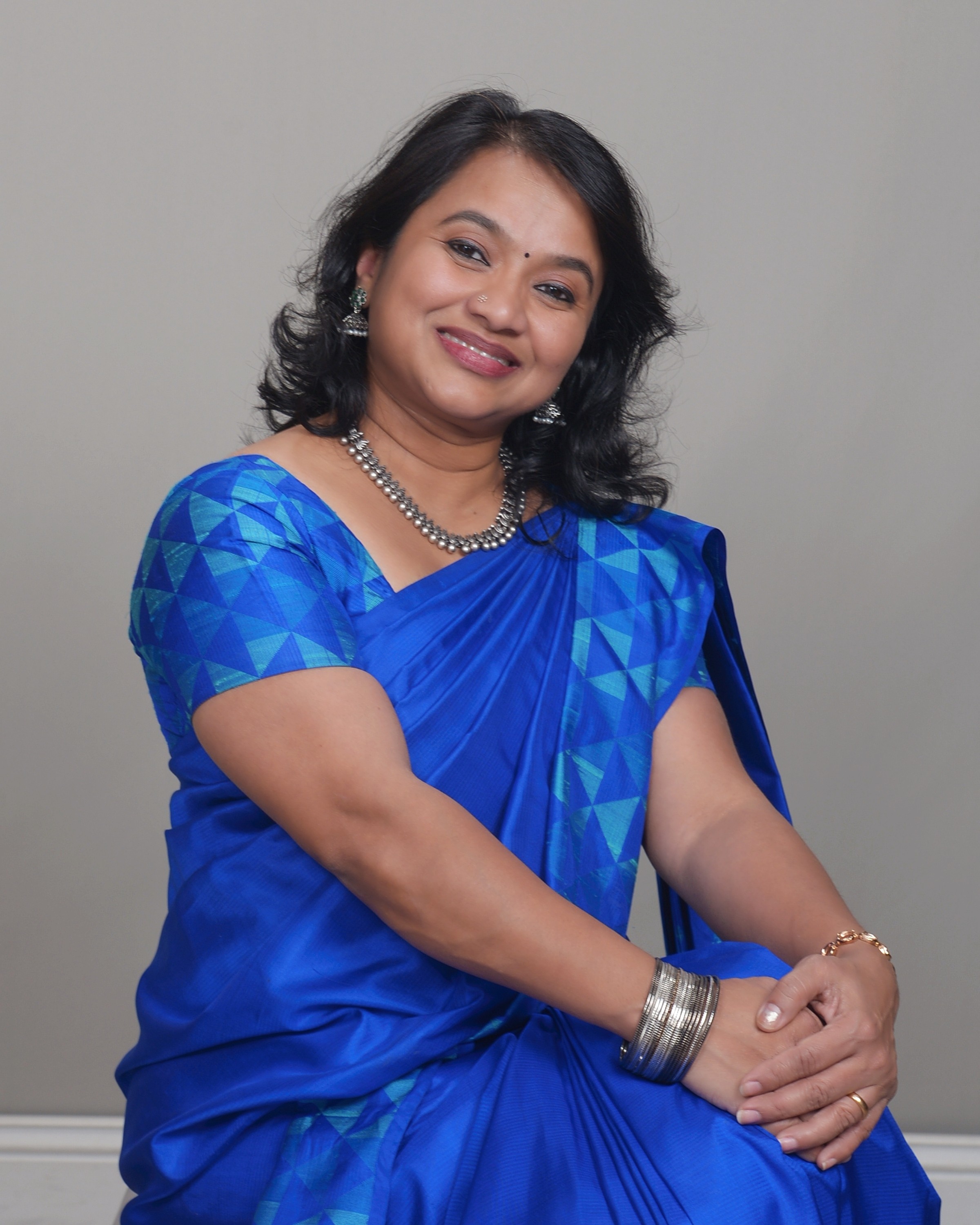 Smitha Bobby Thomas, professional saree draper and founder of Twist of Tradition, Austin Texas