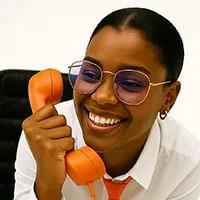Admin lady answering a phone at workplace