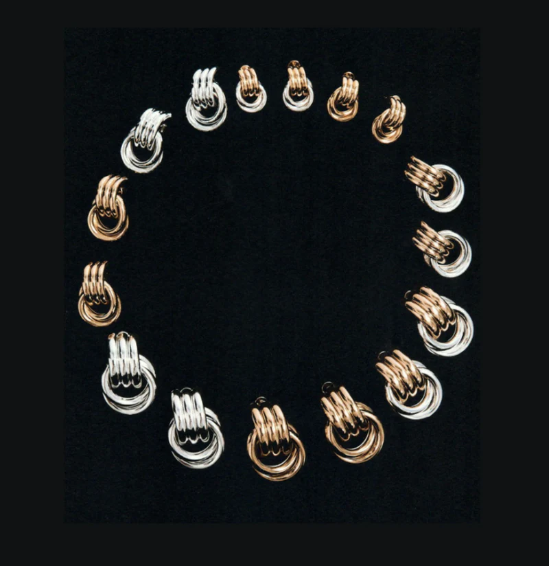 Heaven Mayhem gold and silver earings in circle Ground AI