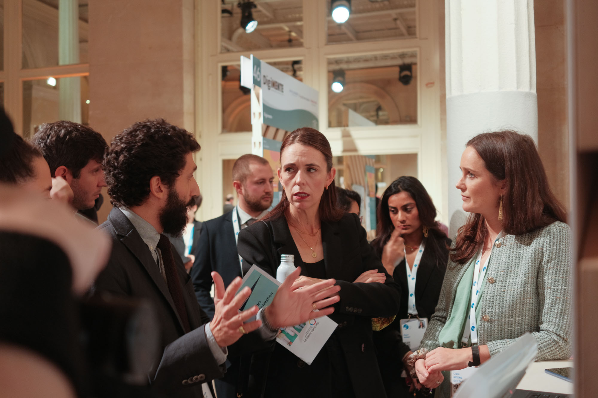 People at the Dalil booth at Paris Peace Forum