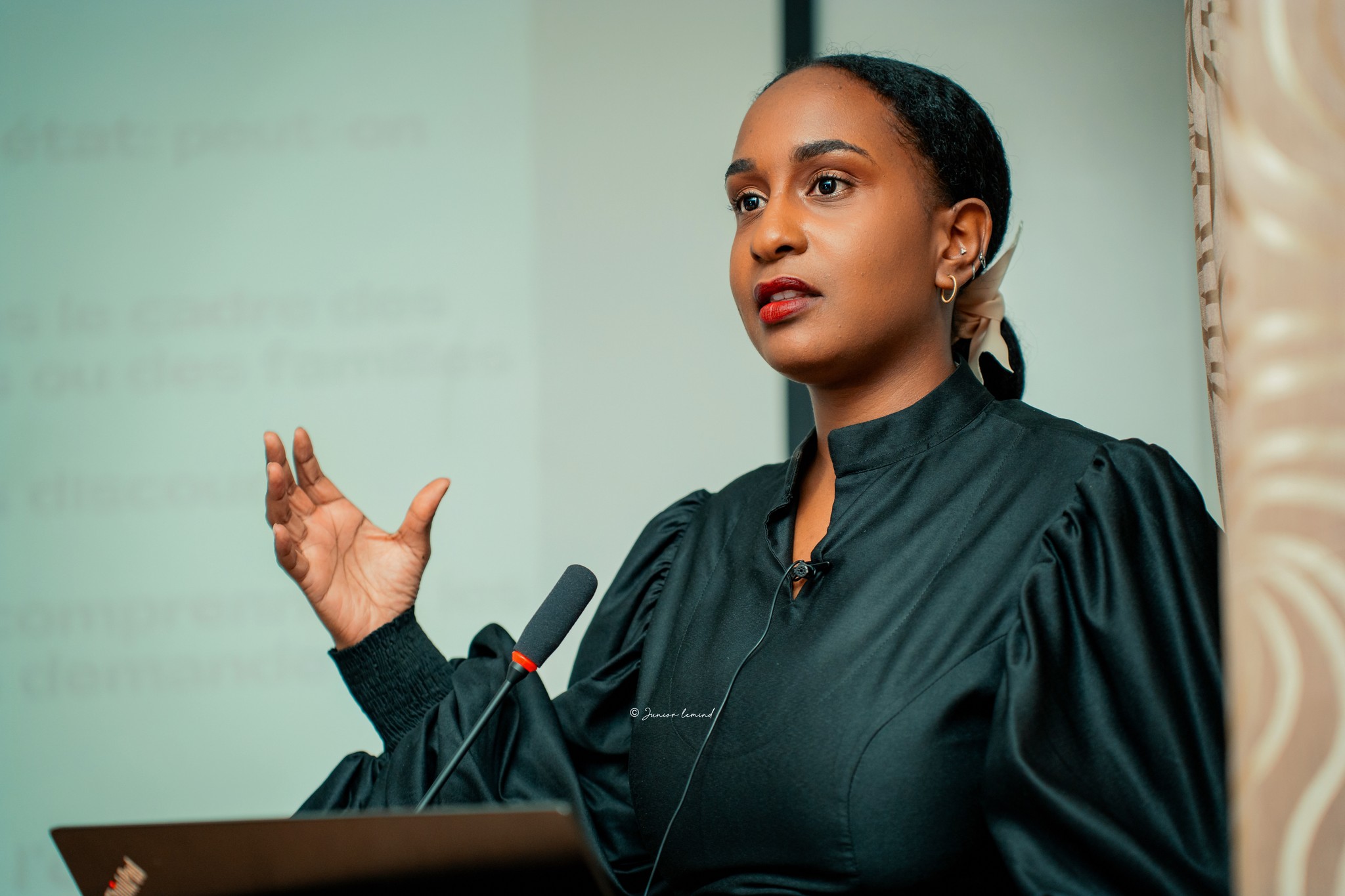 woman in blue hijab sitting on chair