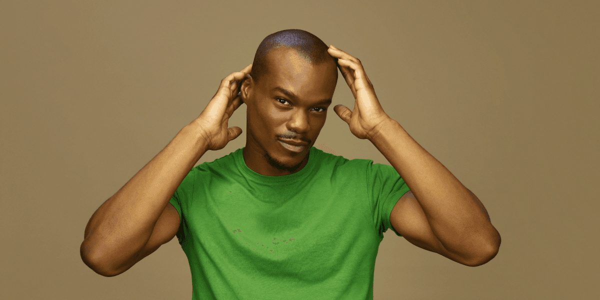 A Ghanaian man concerned about hair loss