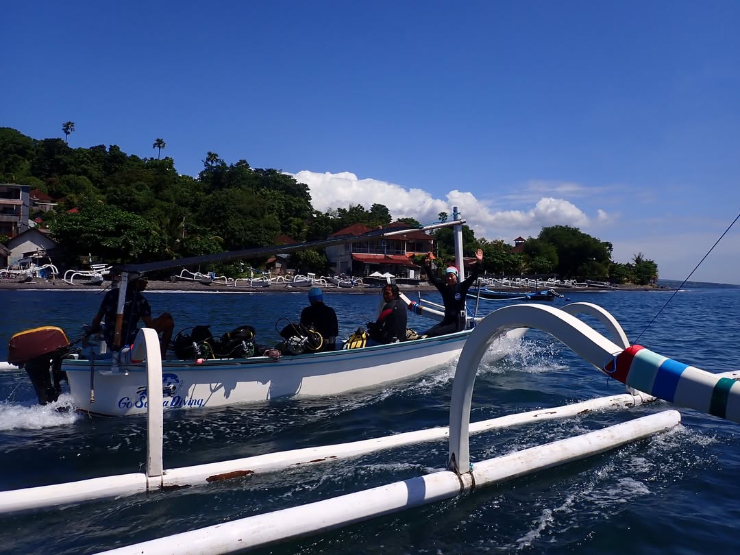 a pool with a table and chairs next to it