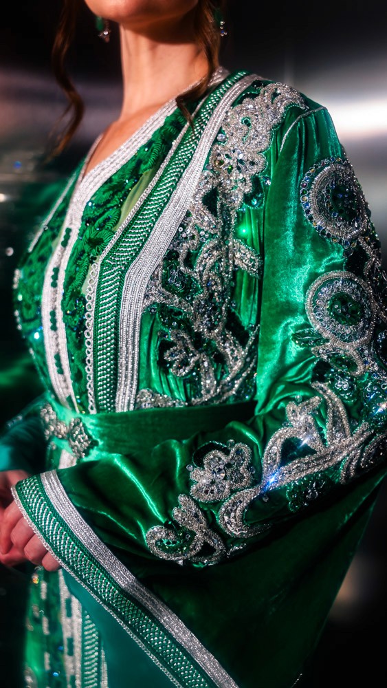 Emerald Moroccan caftan with silver hand embroidery, luxury handcrafted design prepared in Bahrain and finished by Moroccan artisans