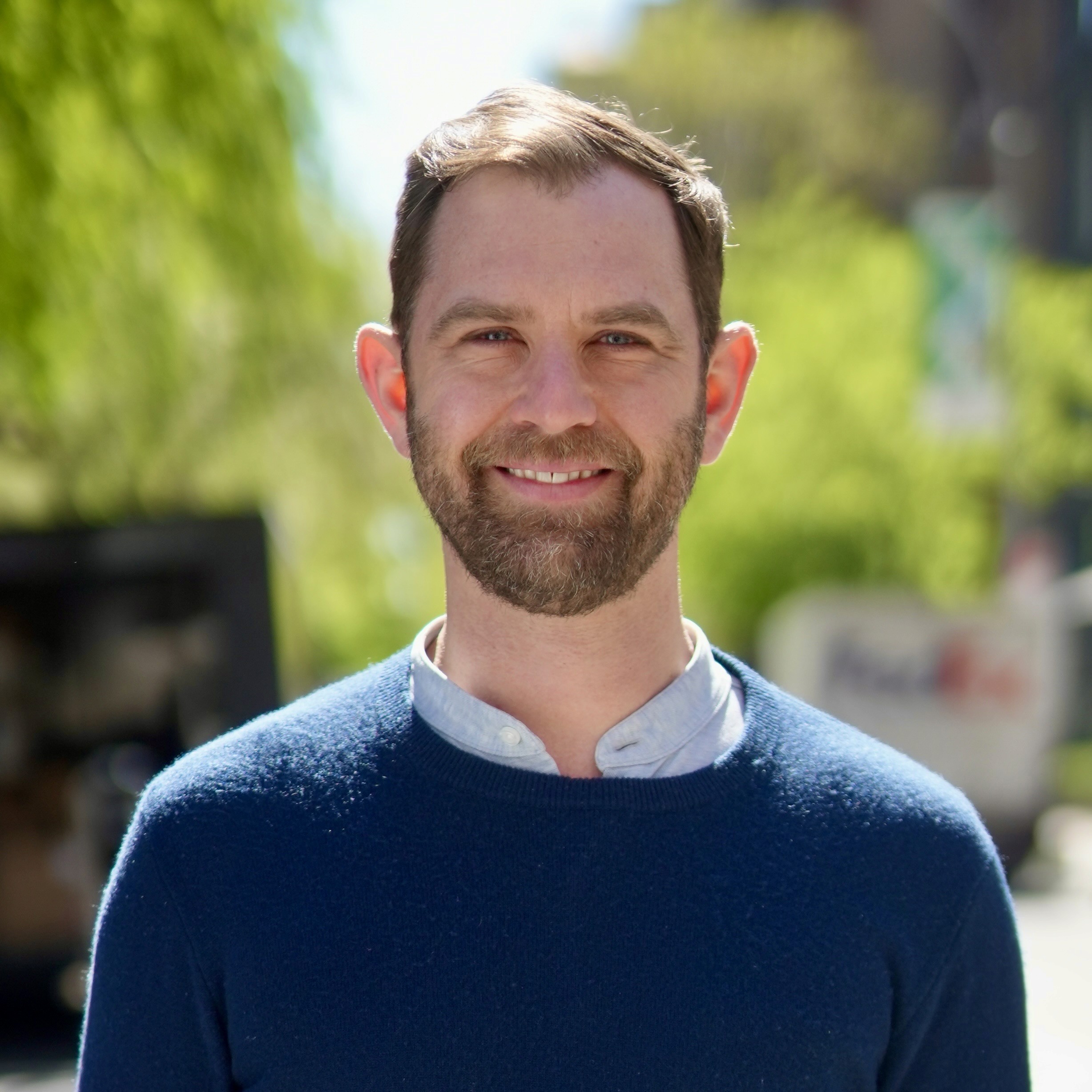 Headshot of Tyler Hartrich, Design Leader & Educator