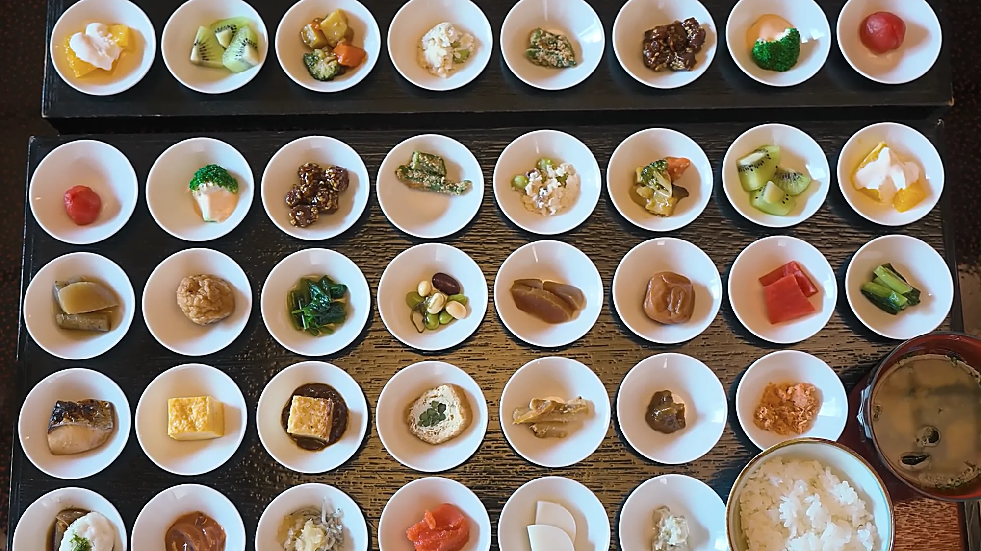 A full ryokan breakfast at Kurokawa Onsen, rice and miso among many small dishes