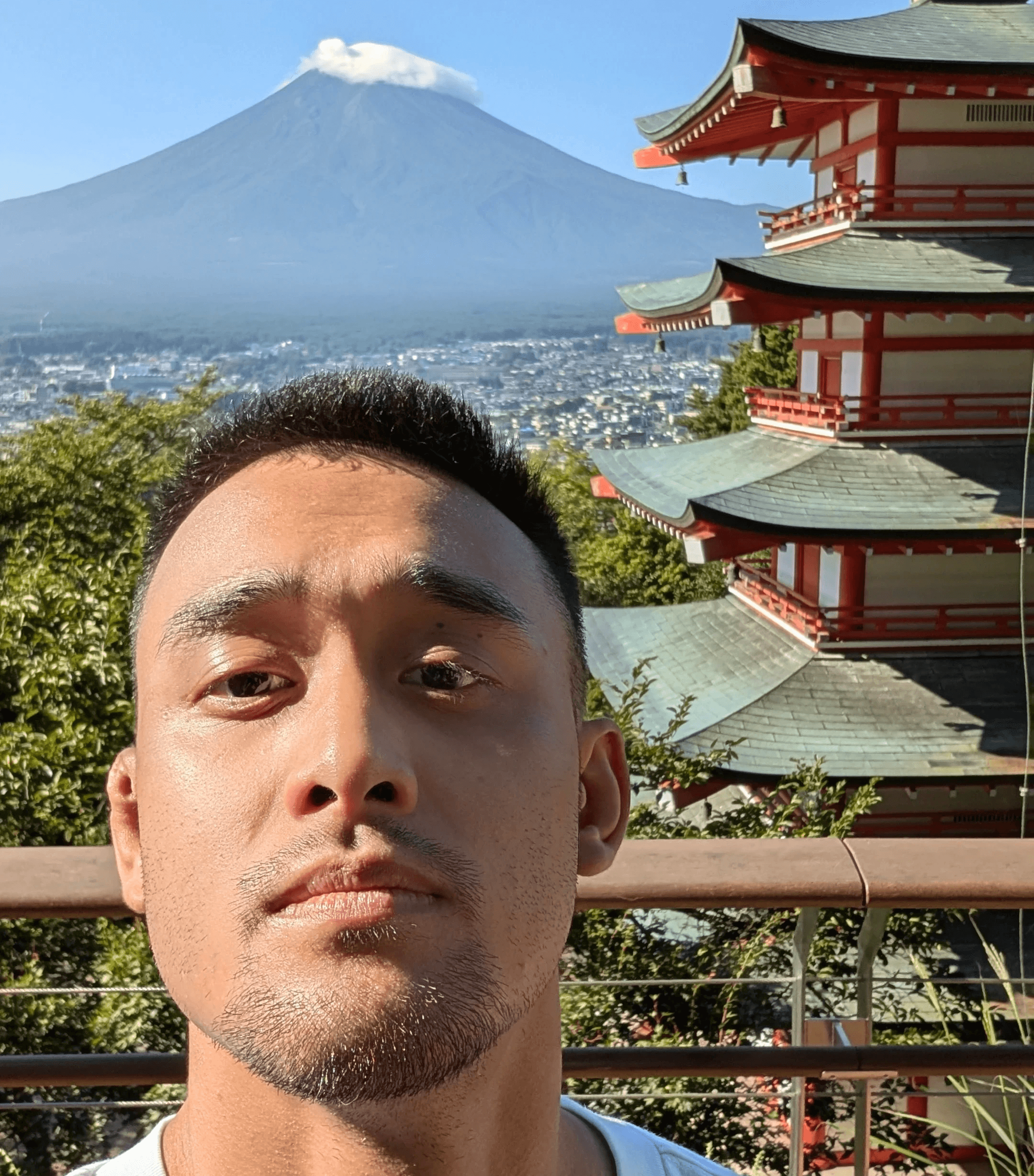 Ellixs Tulagan in Japan with Mount Fuji and a red pagoda overlooking Fujiyoshida.