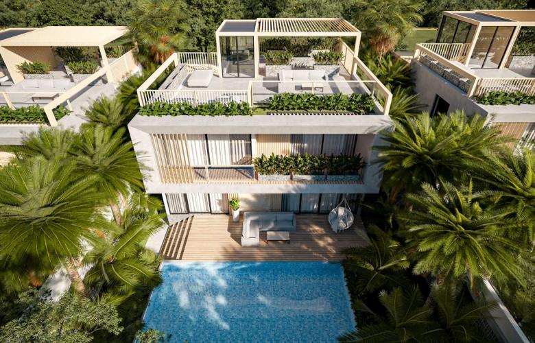 Top-down view of a luxury Canggu villa featuring a rooftop terrace and private swimming pool.