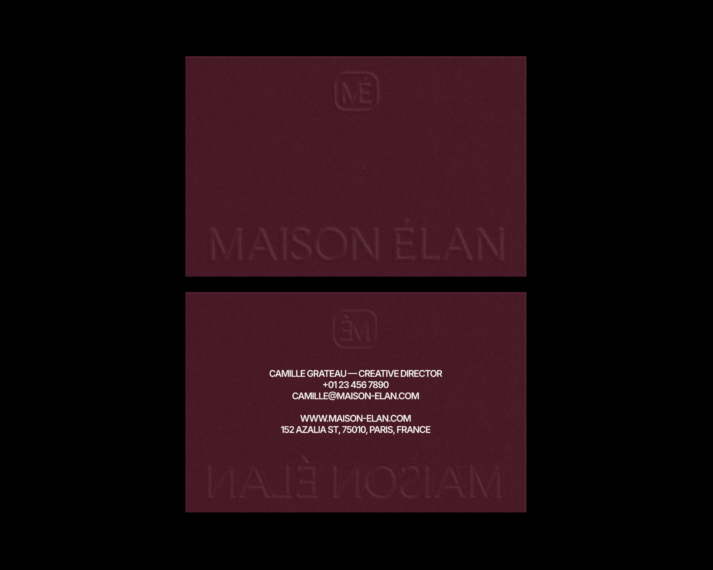 Maison Élan business cards. The logo is embossed on the front. The back has the employee and company details printed in the center. The cards are burgandy.