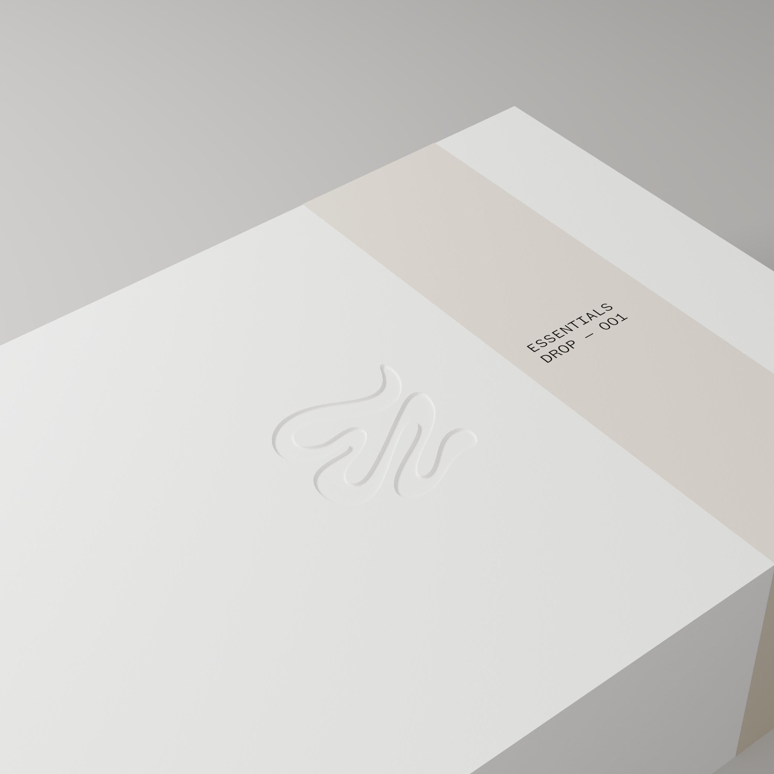 Close-up of the BLNKK embossed symbol and natural paper sleeve