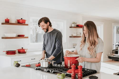Man and woman cooking