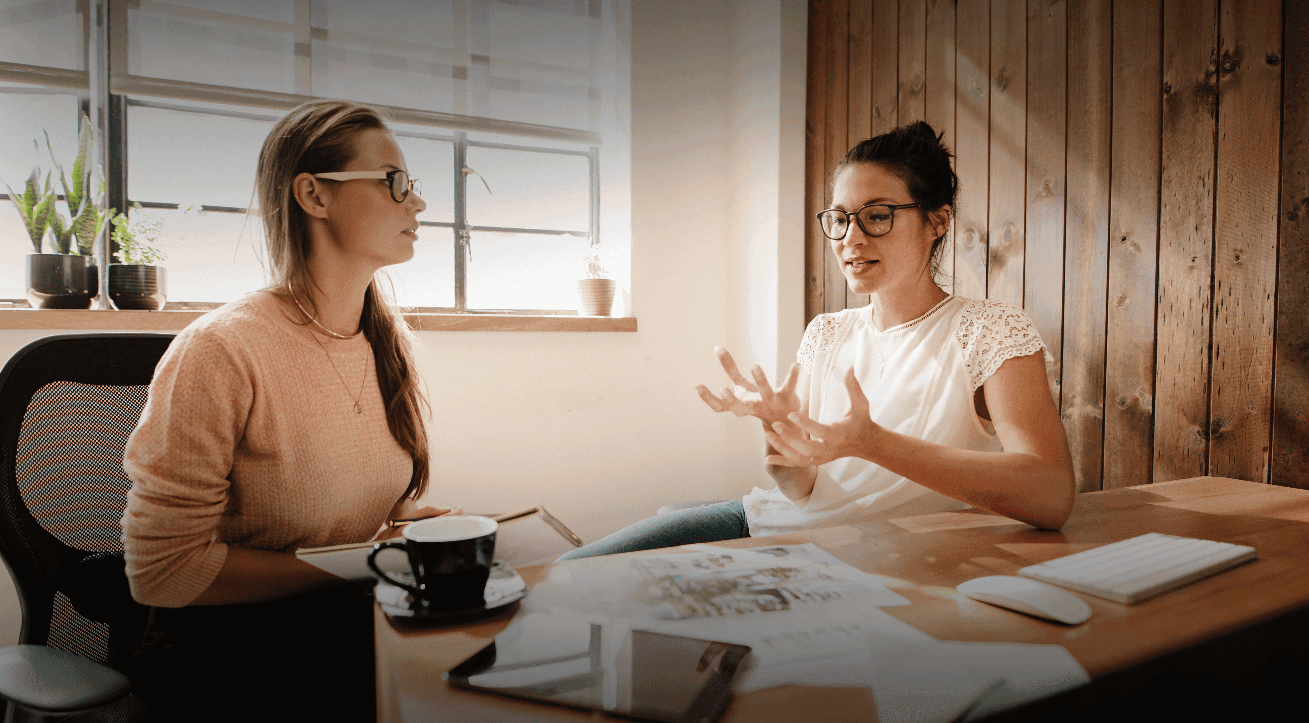 Two women discussing a Residential Property Solicitor Vacancy in Farnborough