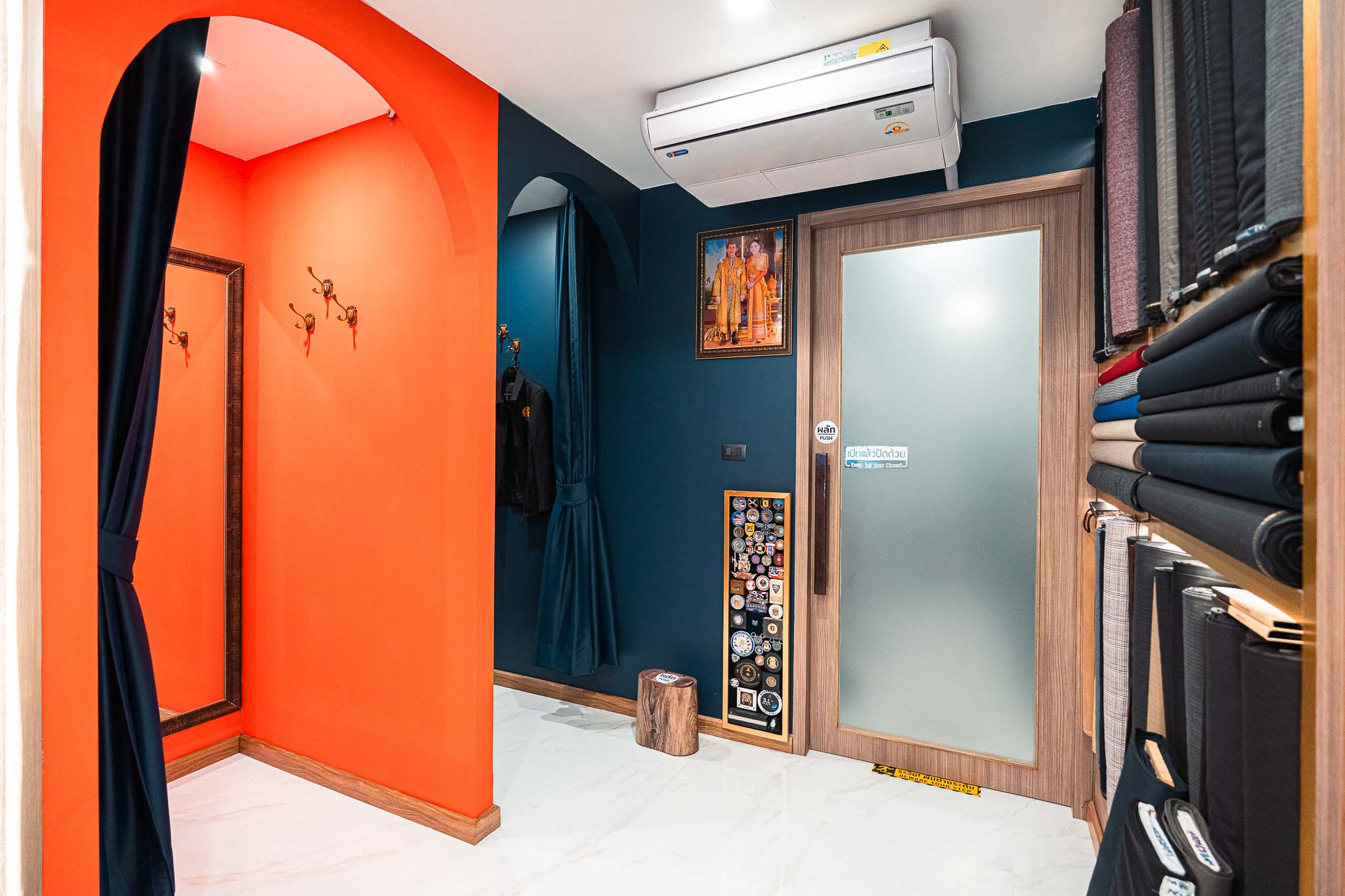 man in black suit jacket and black hat