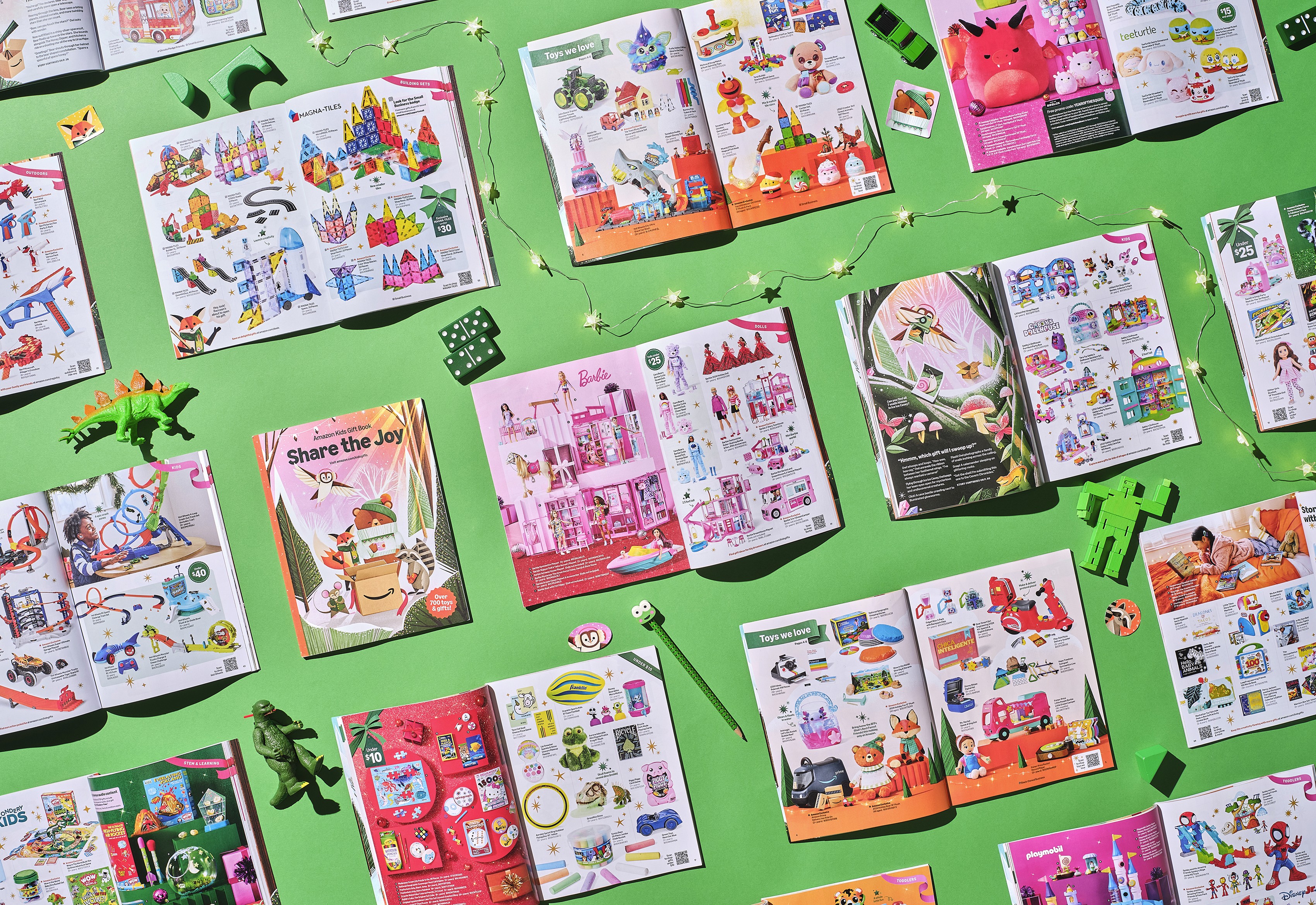 Streetside billboard with flyposters of the Batch.Works brand and illustrations