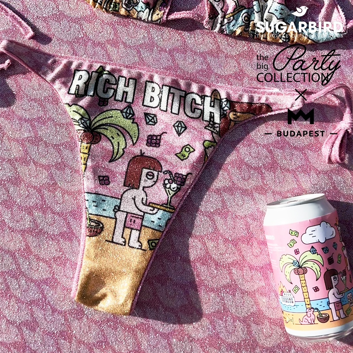 Woman in blue hat and sweater sitting on couch with laptop.