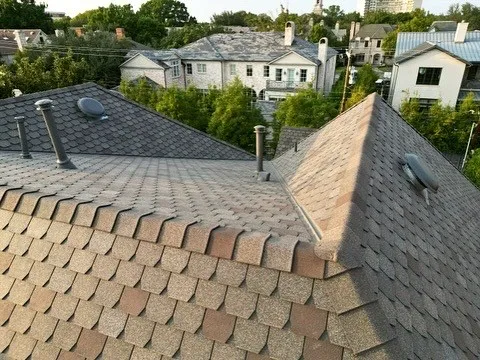 Close-up of F-Wave designer shingles installed on a steep-sloped roof in Highland Park, TX by Arrington Roofing