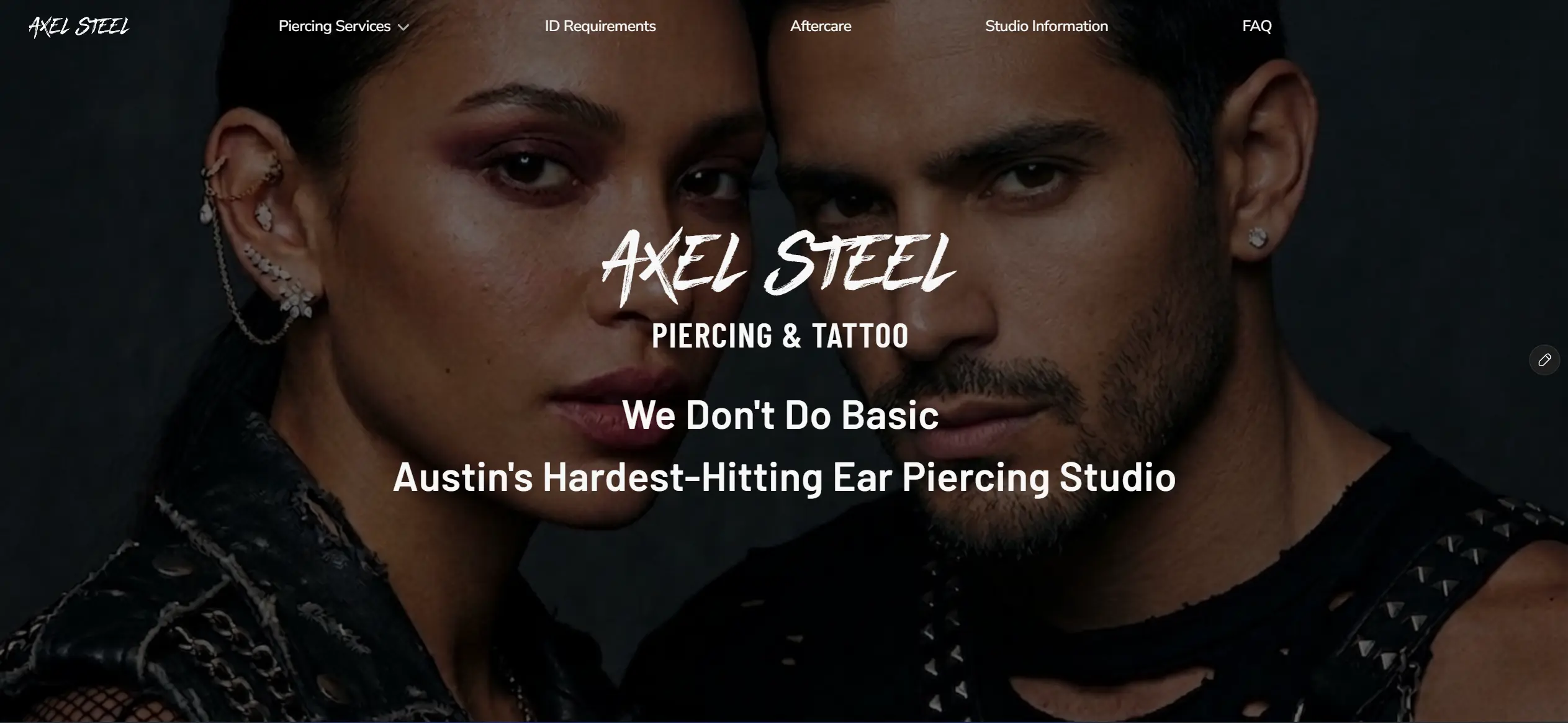 Two models with serious expressions are featured on a piercing and tattoo studio website with dark, dramatic lighting and fine jewelry, emphasizing bold aesthetic and style Bradenton, FL.