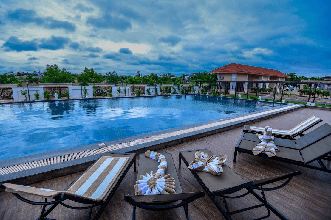 Resort style clubhouse at SKYZ CITY township, luxury amenities in properties in Hubli Dharwad by UK Groups