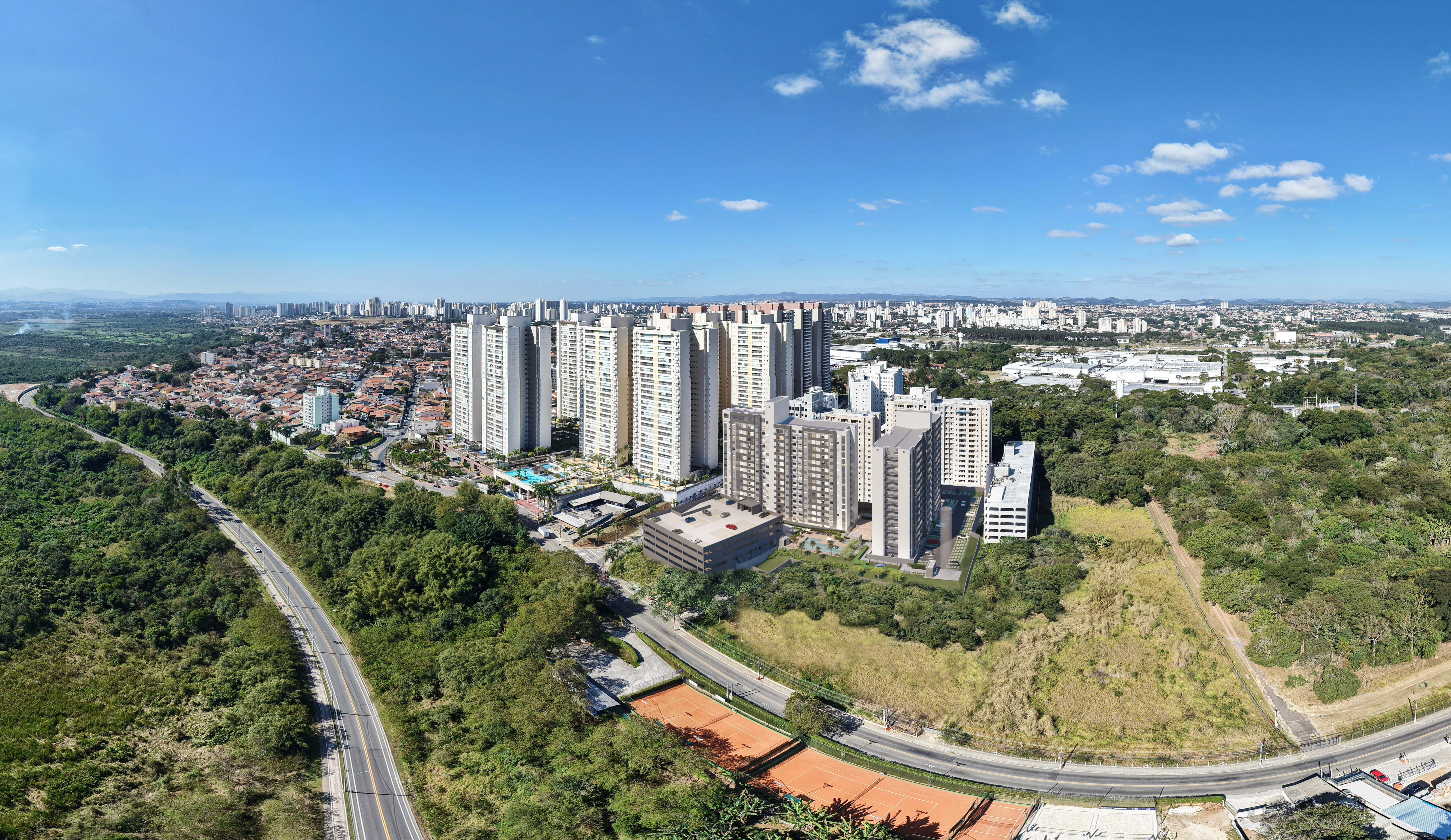 Curved modern skyscraper against a clear blue sky.