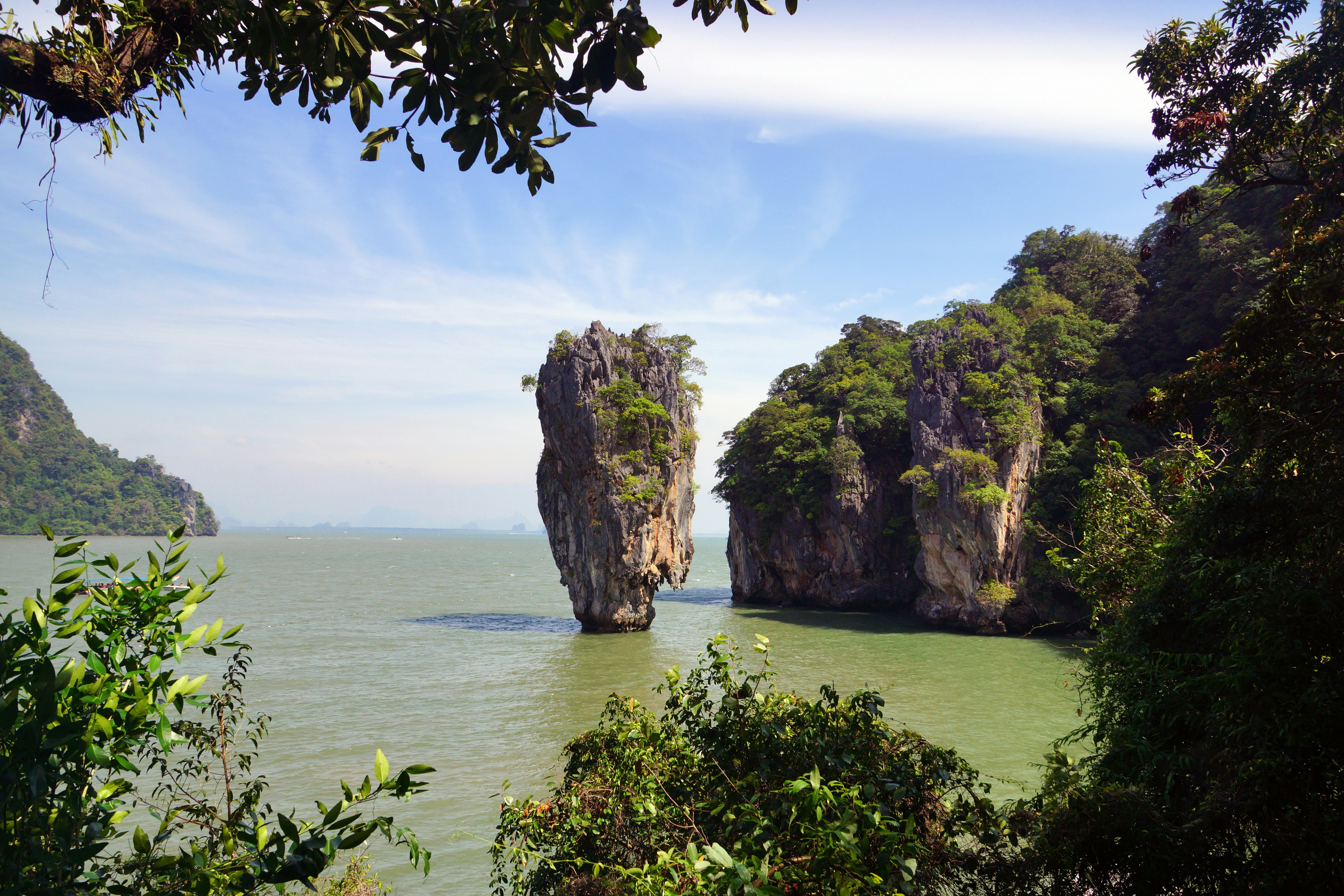 A body of water surrounded by trees and rocks