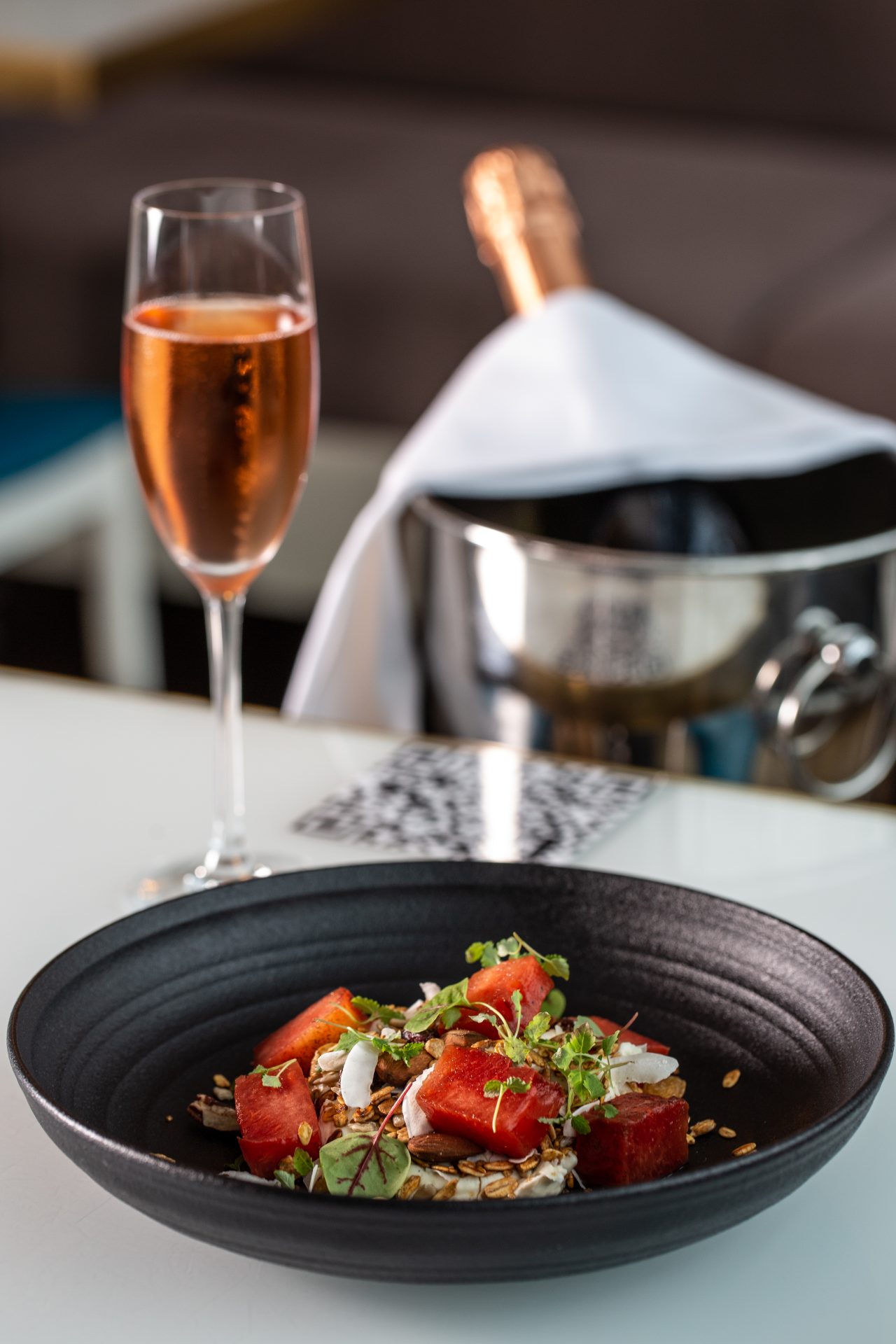 a woman holding a red flower