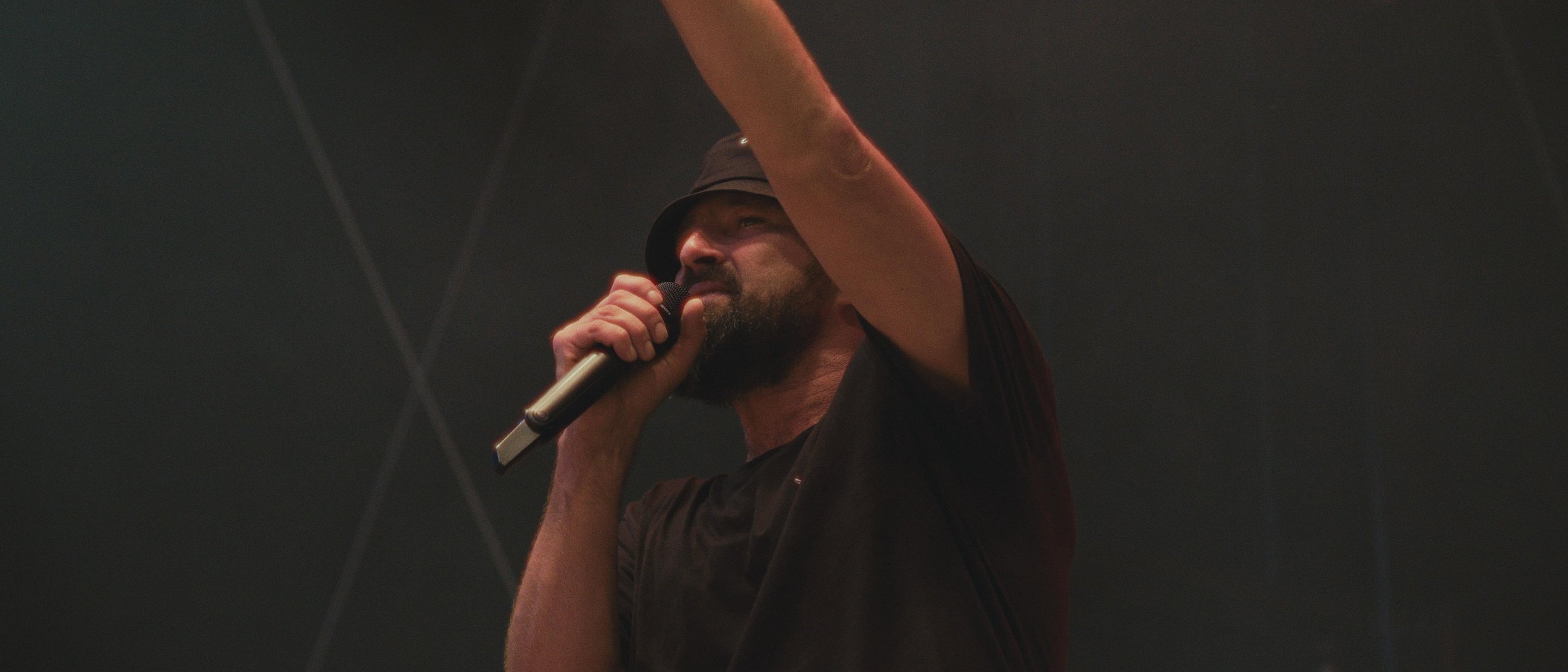 Streetside billboard with flyposters of the Batch.Works brand and illustrations