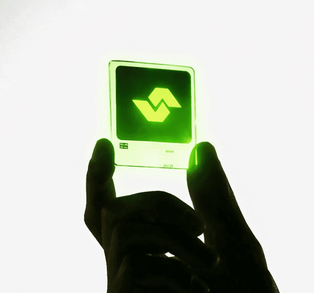 A close-up of a luxurious skincare jar with a gold lid, set against a soft, neutral background with gentle shadows.