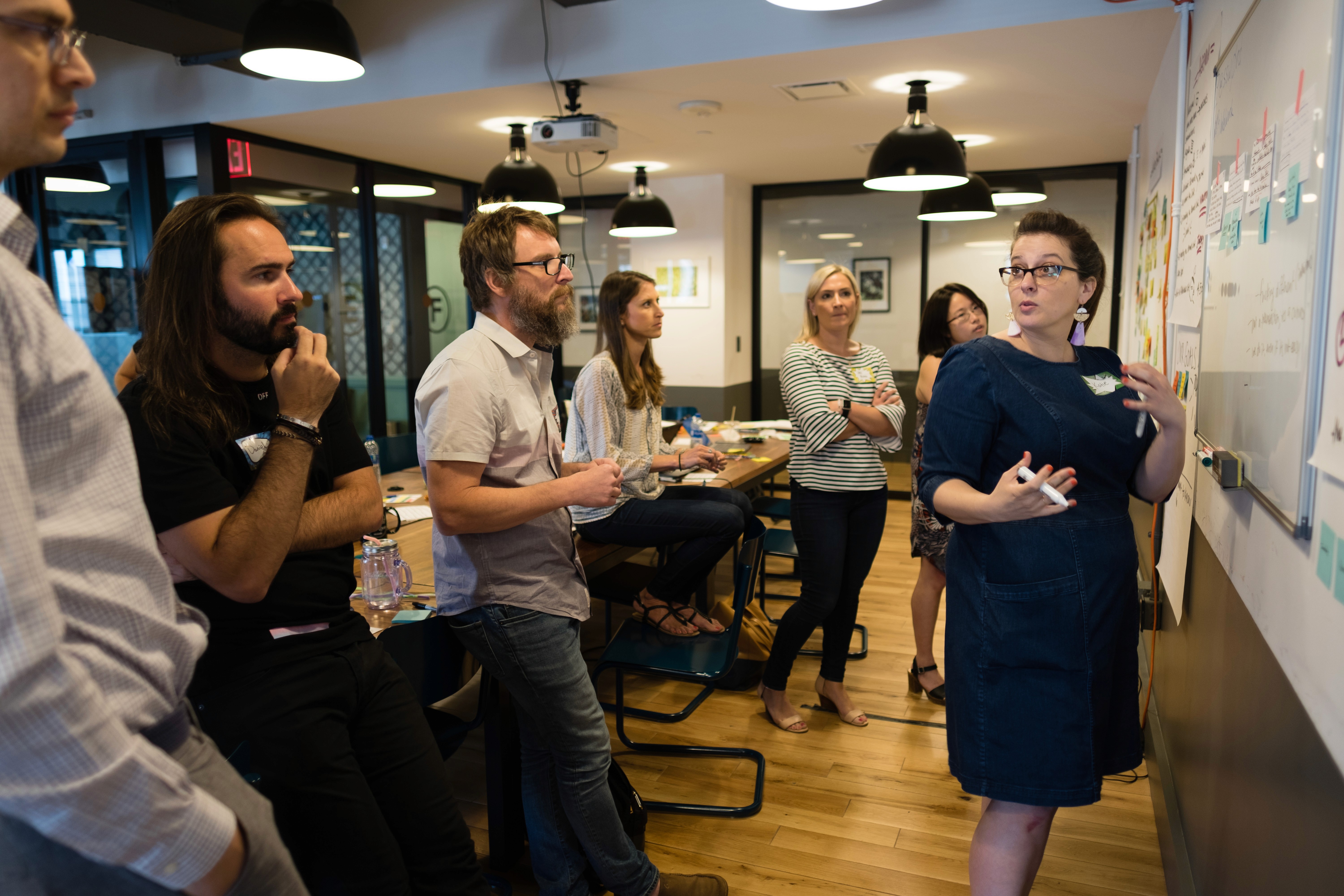 Picture of a group of people brainstorming.