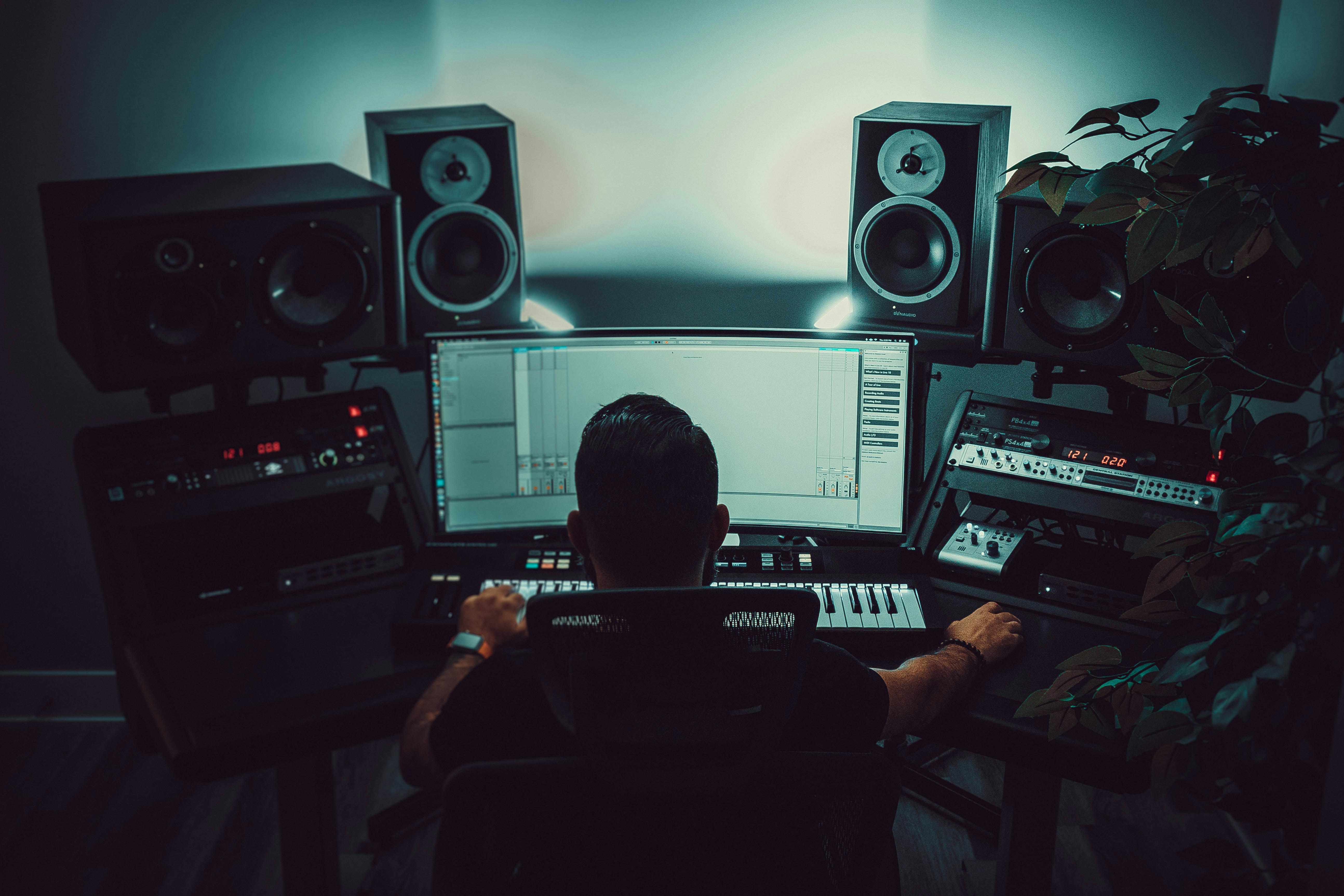 Man using Best Music Production Software on his Professional setup